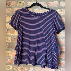 Anthropologie Navy Blue and pink stripped pullover top with ruffled back peplum